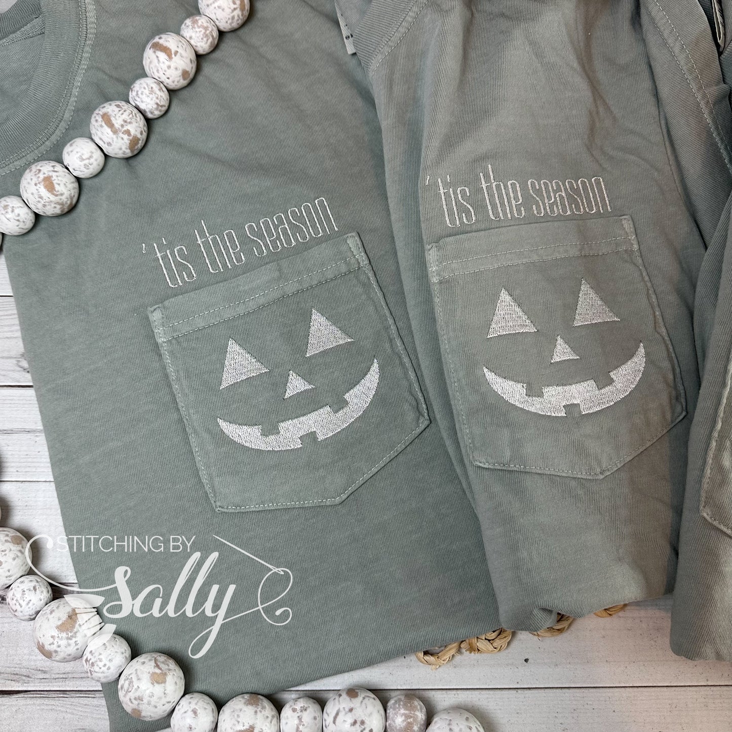 Two shirts with Tis the Season embroidered pocket t-shirt