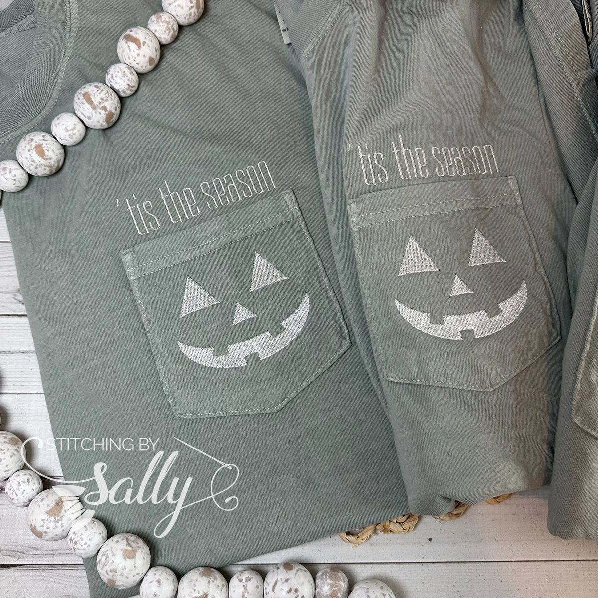 Two shirts with Tis the Season embroidered pocket t-shirt