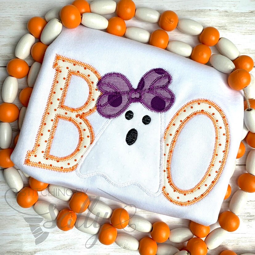 Front view of girls Halloween shirt with BOO appliqué and ghost with bow