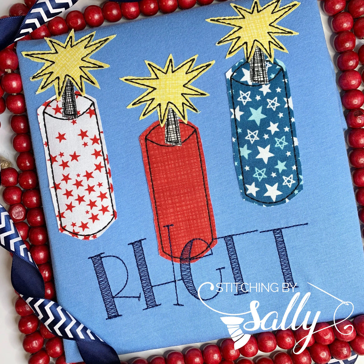 Custom boys' fireworks appliqué shirt in red, white, and blue, and embroidered name, perfect for 4th of July celebrations