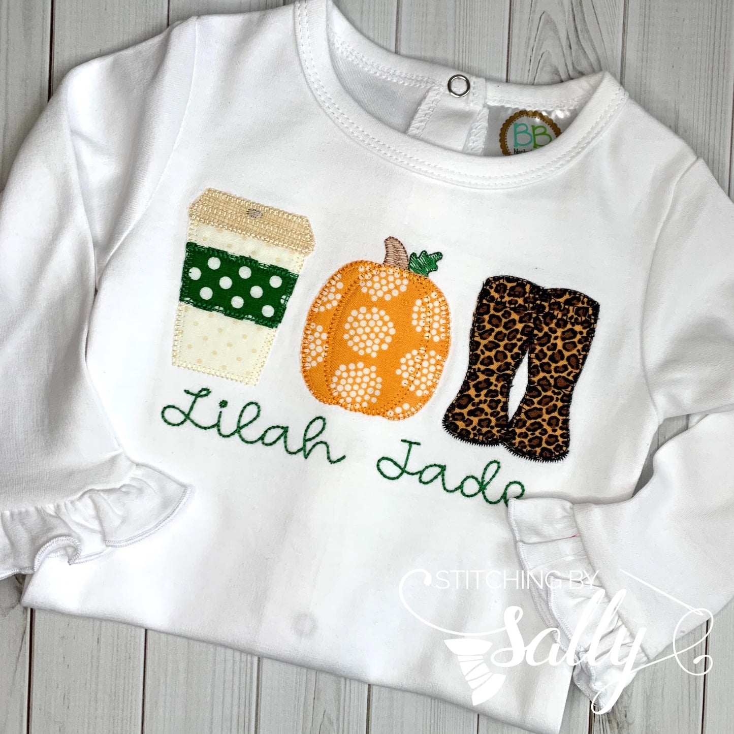 Front view of girls' fall trio shirt with latte, pumpkin, and leopard boots