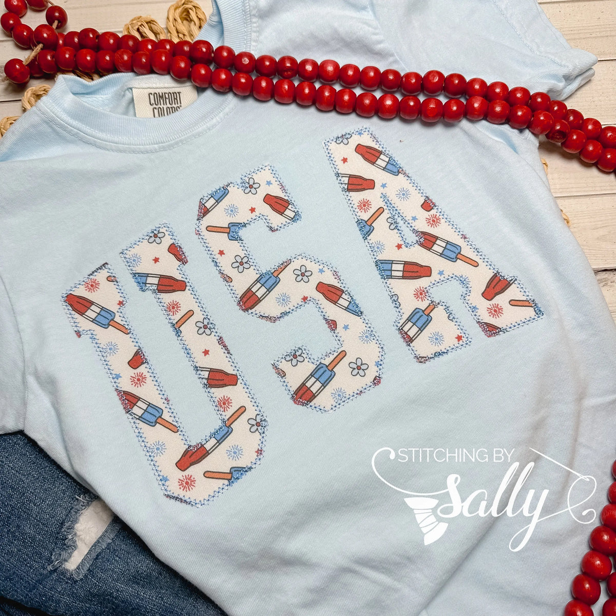 Oversized youth girls USA appliqué shirt, perfect for 4th of July, patriotic parades, and summer celebrations.
