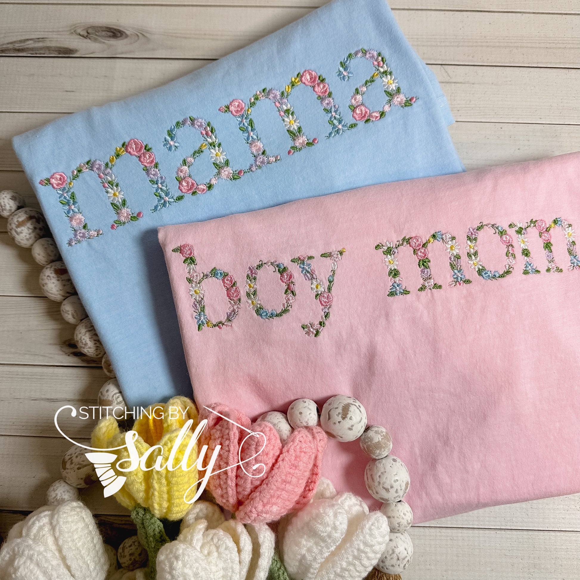 Embroidered mama and boy mom shirts. Font is a delicate floral design.