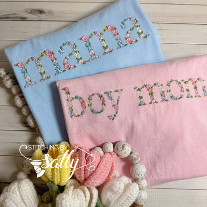 Embroidered mama and boy mom shirts. Font is a delicate floral design.