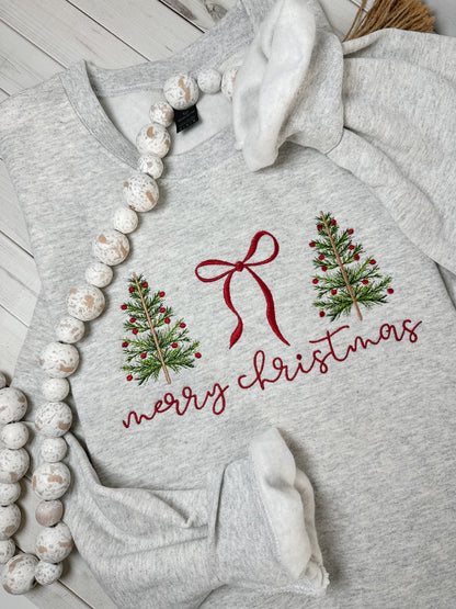 Gray sweatshirt with Christmas design featuring trees and a bow embroidered.