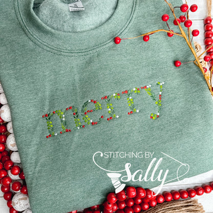 Green sweatshirt with "merry" embroidered in festive leaves and berries font, perfect for adding a touch of cheer to your wardrobe. 