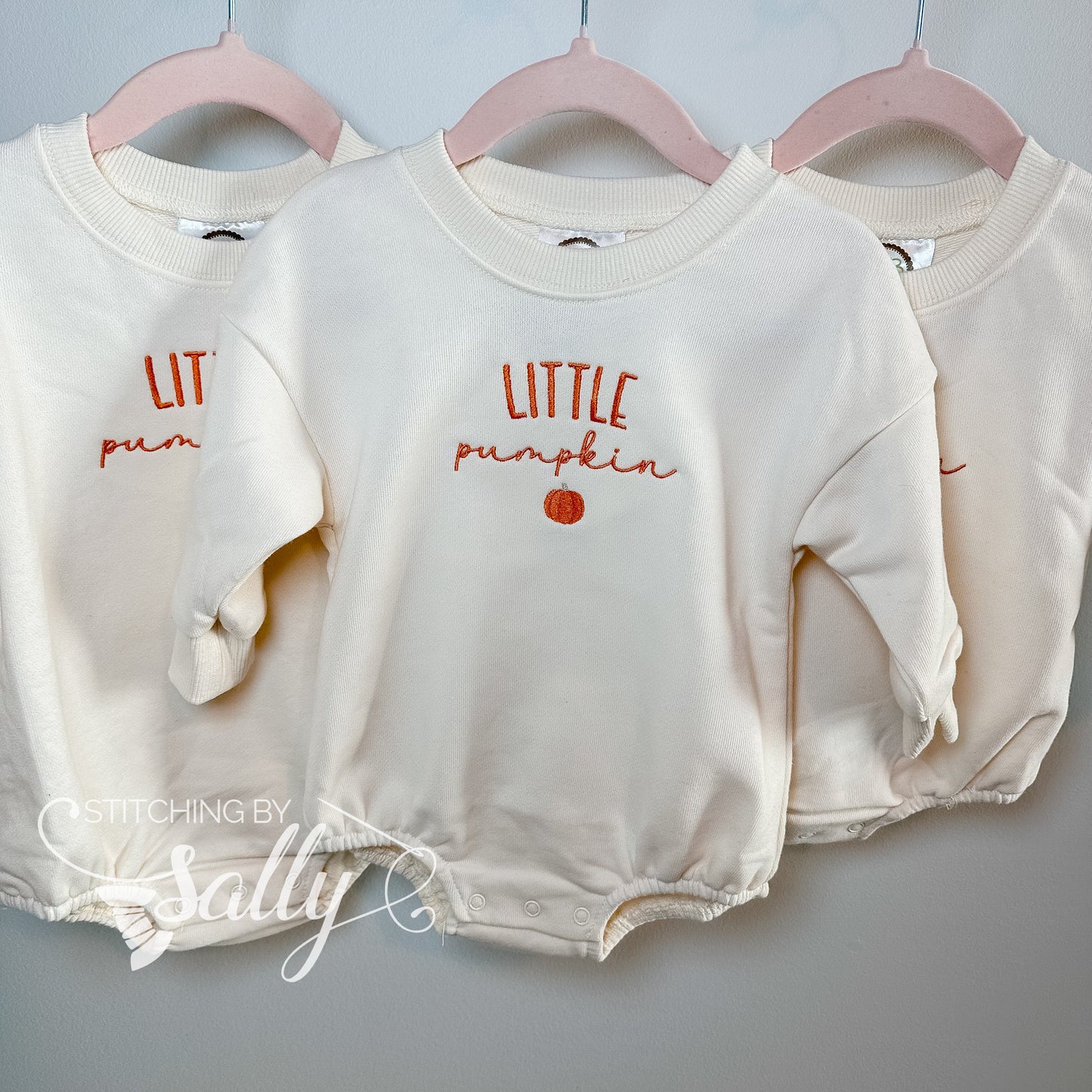 Burnt orange embroidered pumpkin on baby bubble sweatshirt