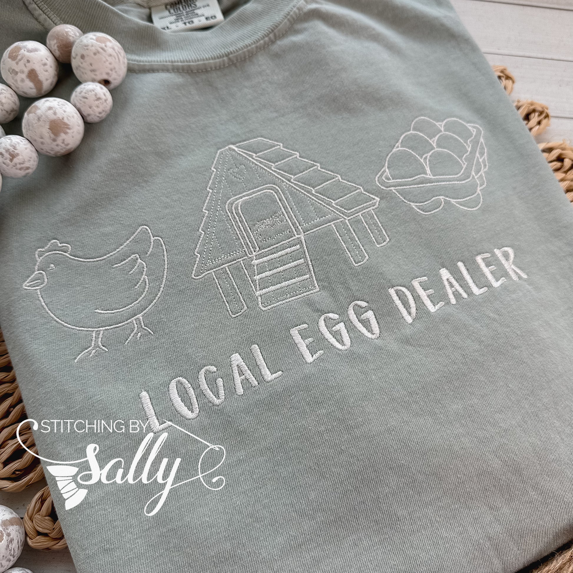 Local Egg Dealer embroidered t-shirt on Comfort Colors, perfect for backyard chicken keepers and homesteaders.