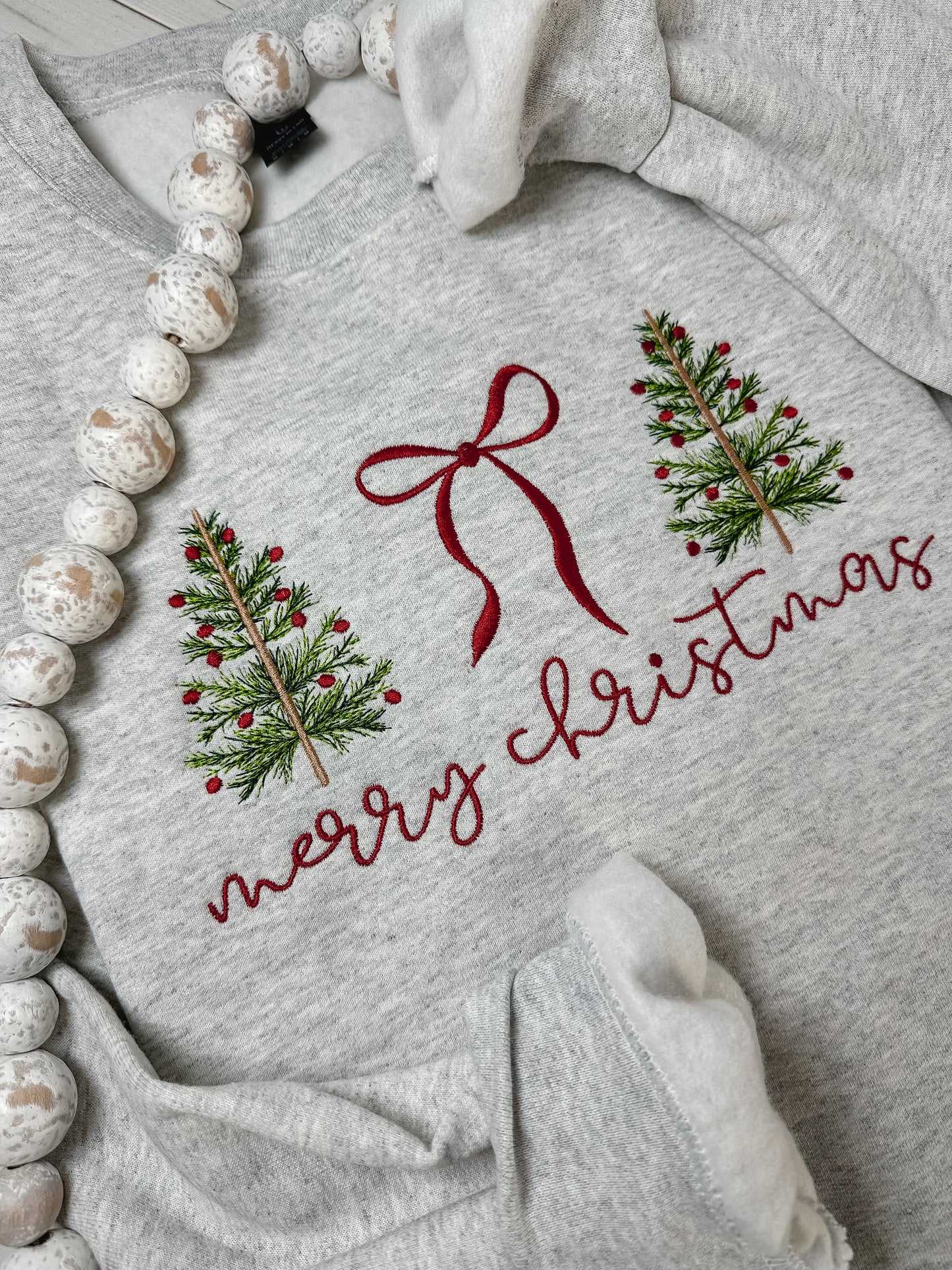 Merry Christmas Embroidered sweatshirt with coquette bow