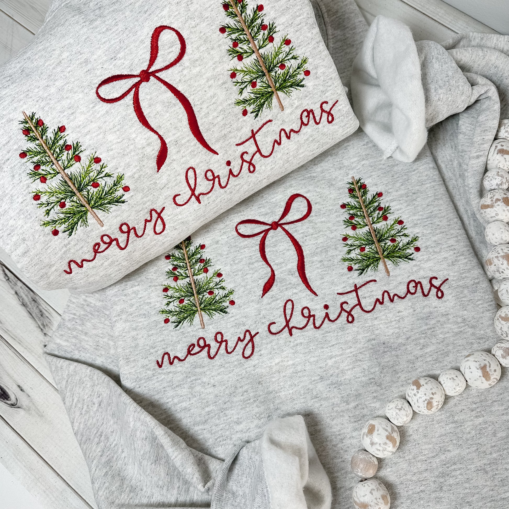 Merry Christmas sweatshirt features the sweetest stitched trees + bow design.
