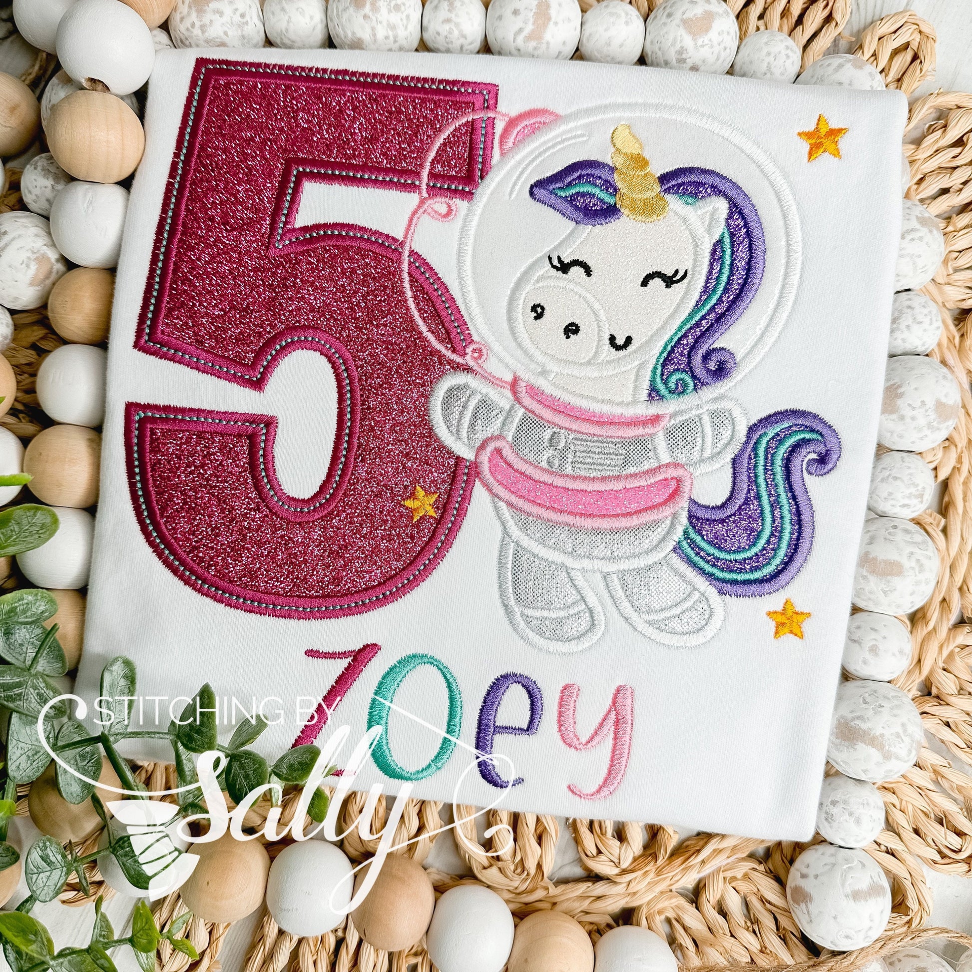 Space Unicorn Appliqué Birthday Shirt with galaxy embroidery, perfect for a space-themed birthday celebration.