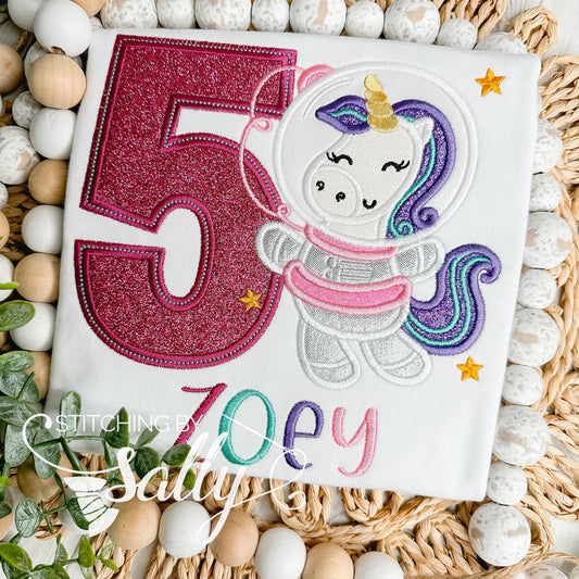 Space Unicorn Appliqué Birthday Shirt with galaxy embroidery, perfect for a space-themed birthday celebration.