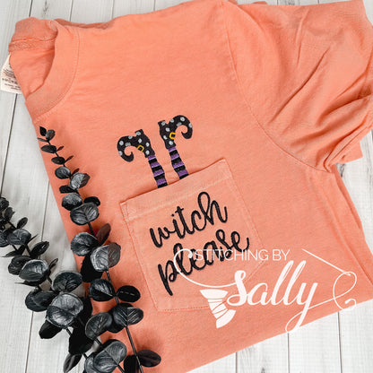 Comfort Colors pocket t-shirt with “Witch Please” embroidered on pocket with legs sticking out.