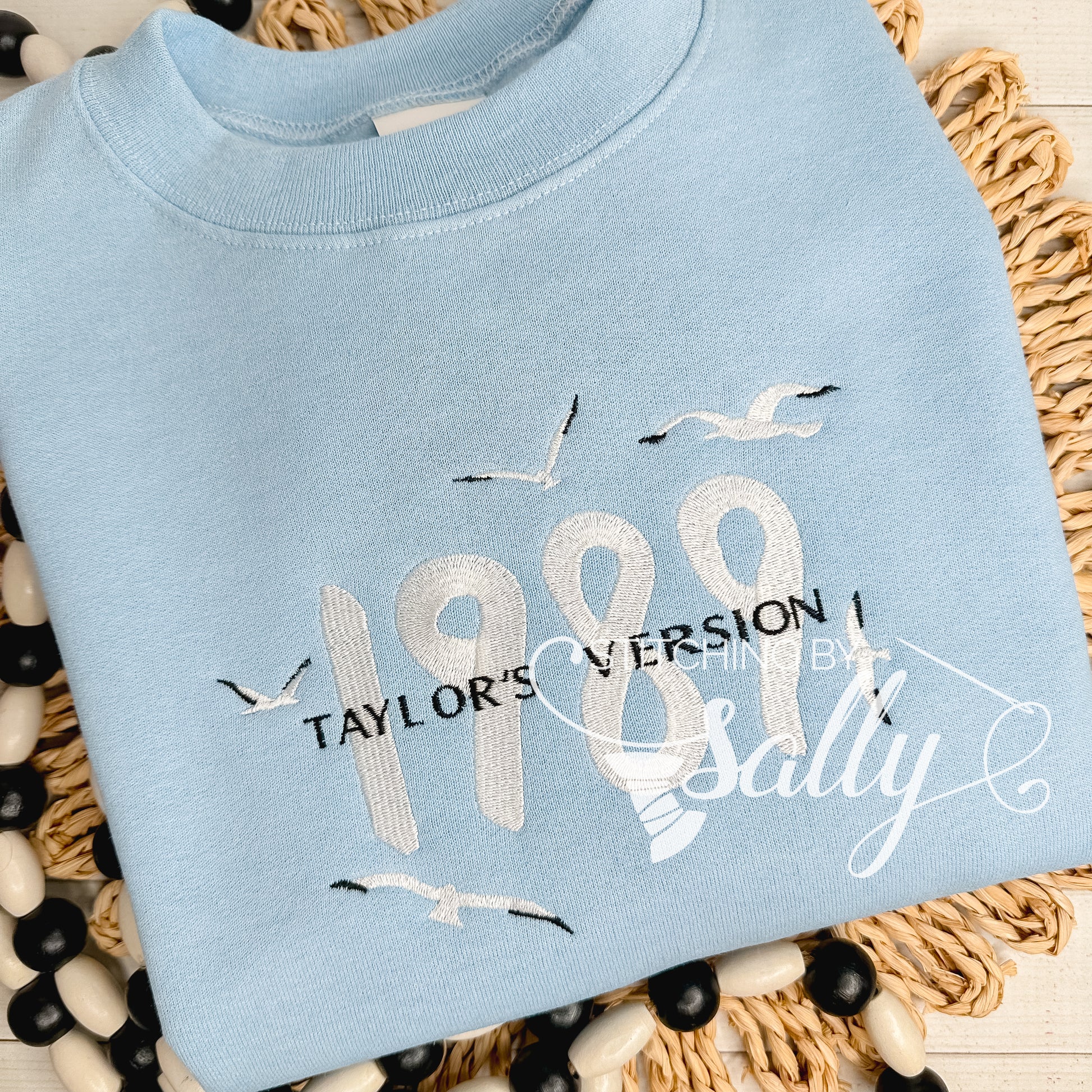 1989 embroidered sweatshirt inspired by Taylor Swift’s album, soft unisex crewneck with minimalist design.
